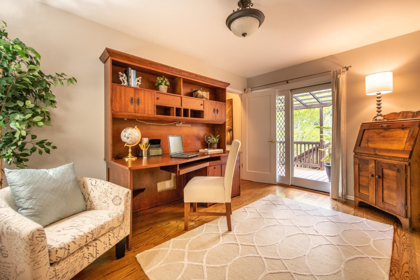 500 Yale Drive San Mateo, CA 94402 - Photo 18 of 35 a living room with furniture cabinets and a window