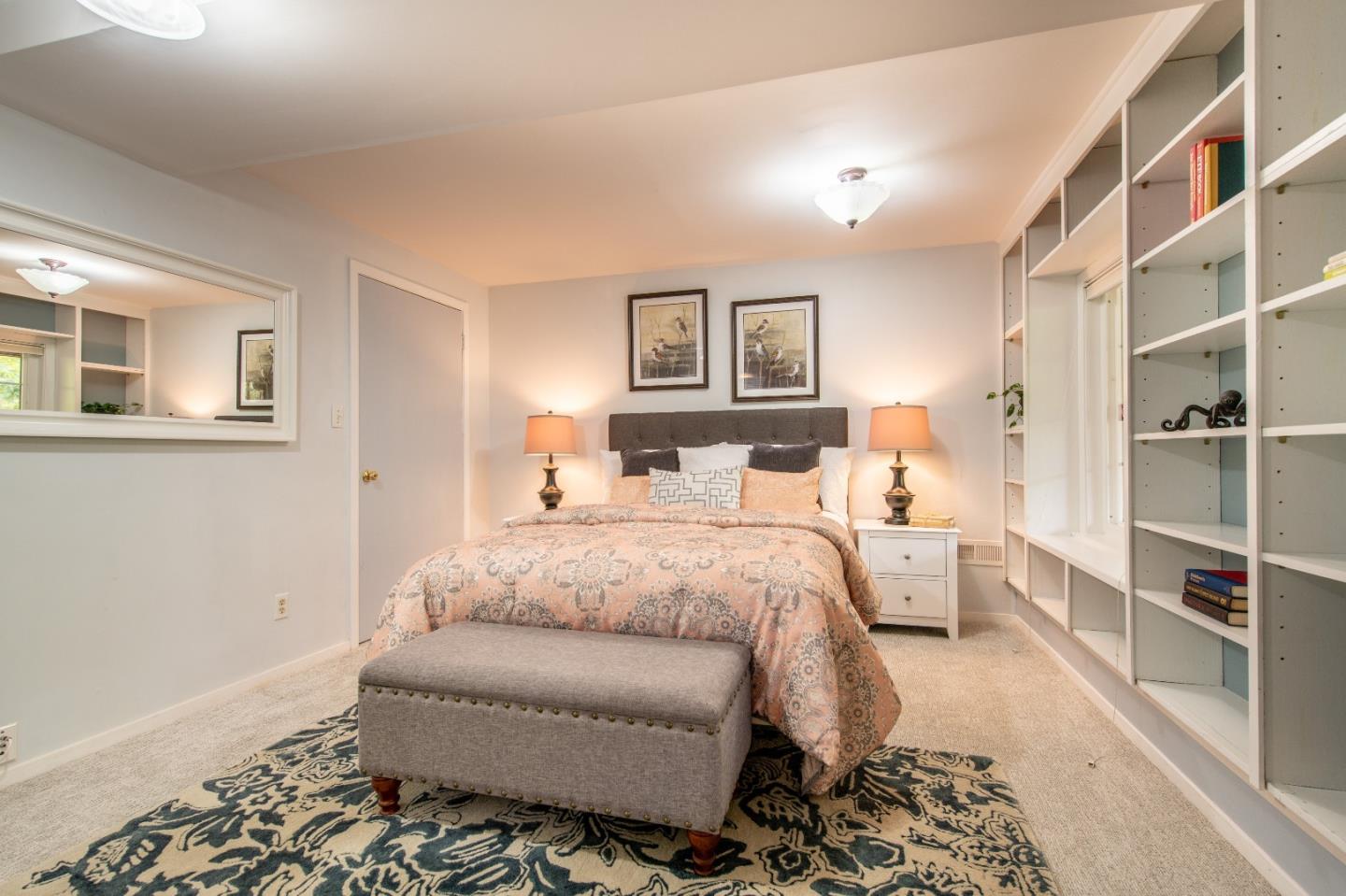 500 Yale Drive San Mateo, CA 94402 - Photo 22 of 35 a bedroom with a bed and a couch