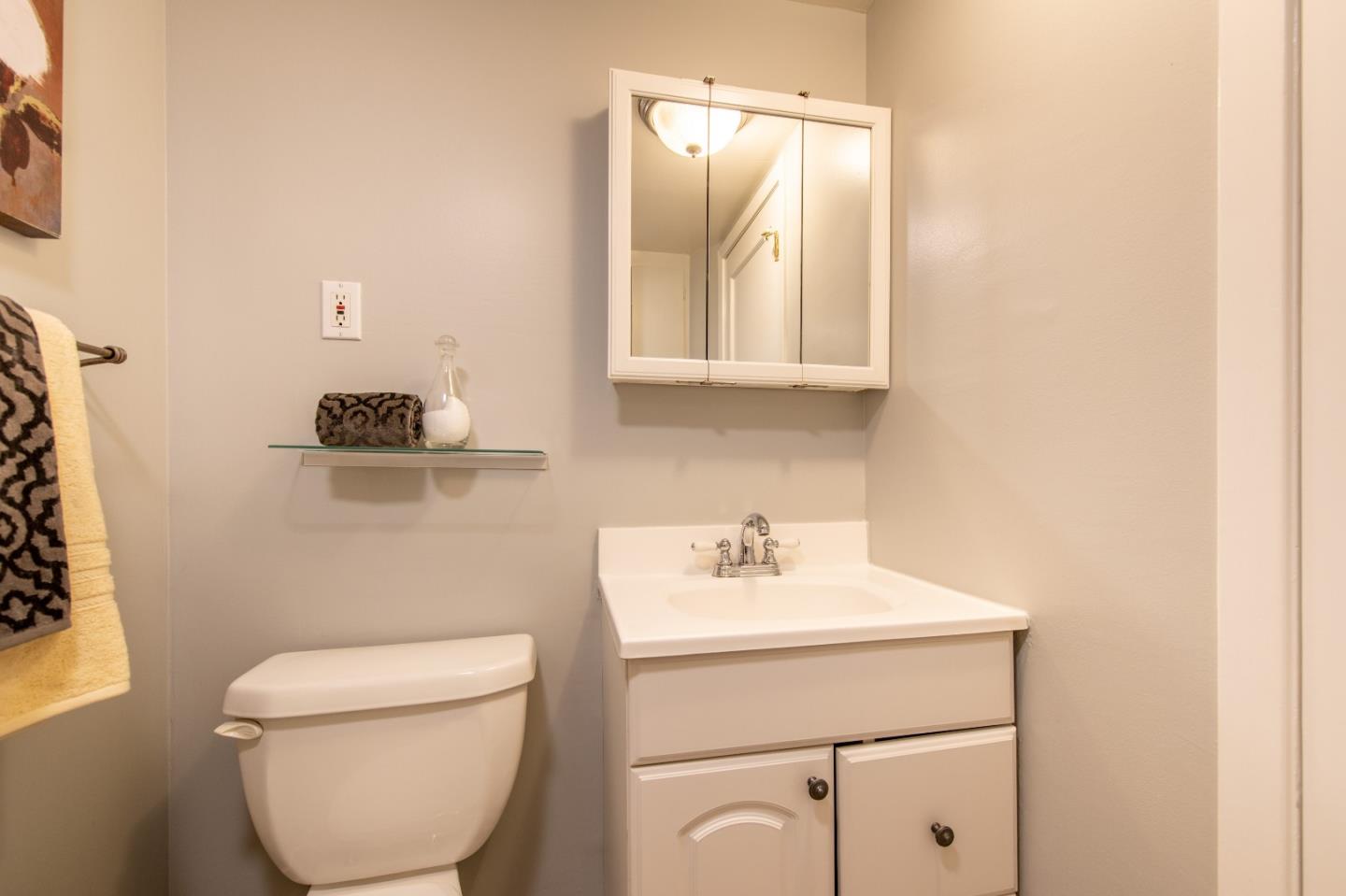 500 Yale Drive San Mateo, CA 94402 - Photo 24 of 35 a bathroom with a toilet sink and mirror