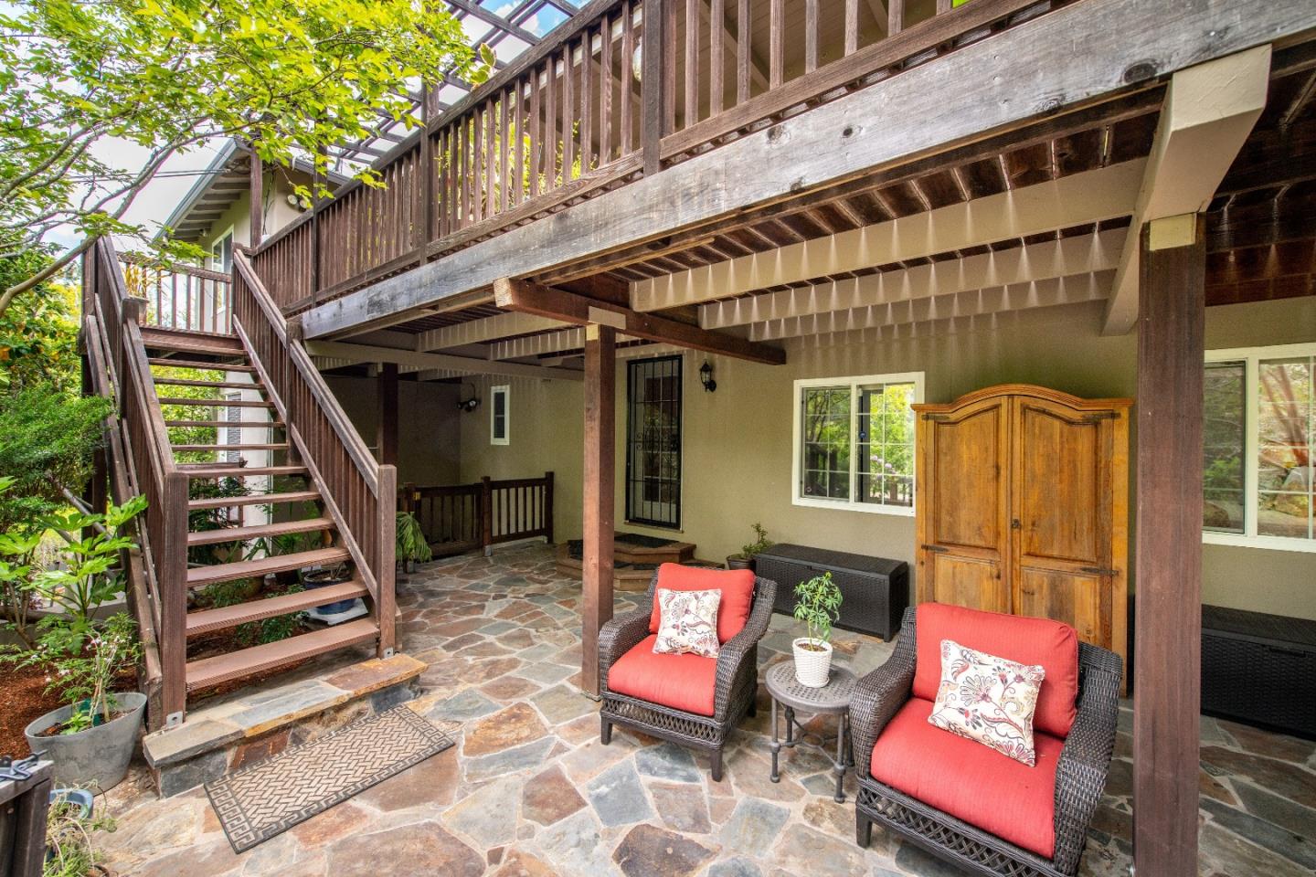 500 Yale Drive San Mateo, CA 94402 - Photo 27 of 35 a front view of a house with outdoor seating and stairs