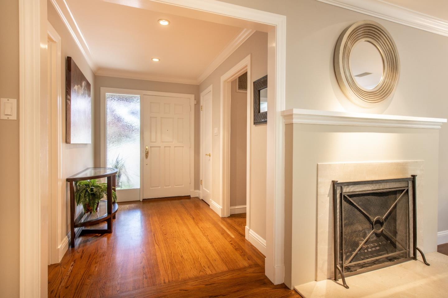 500 Yale Drive San Mateo, CA 94402 - Photo 4 of 35 a view of livingroom with hardwood floor and a fireplace