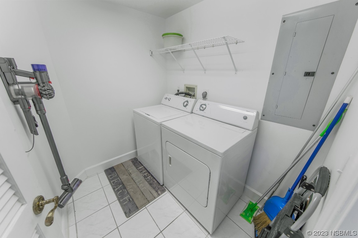 4575 South Atlantic Avenue, Unit 6307 Ponce Inlet, FL 32127 - Photo 31 of 36 a utility room with dryer and washer