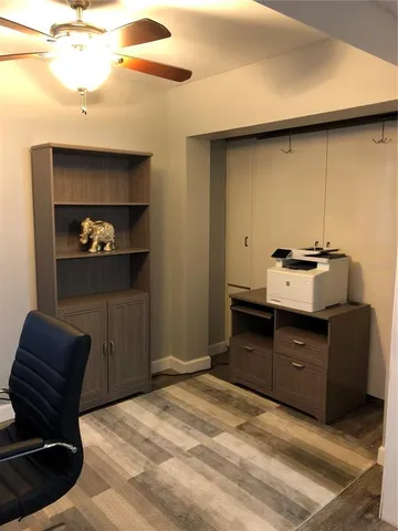 a room with a bed and a chair