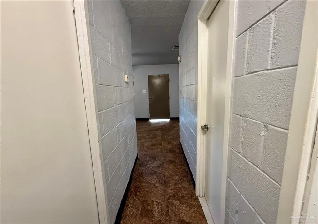 1920 East Iowa Road Edinburg, TX 78542 - Photo 5 of 7 a view of a hallway with wooden floor and staircase