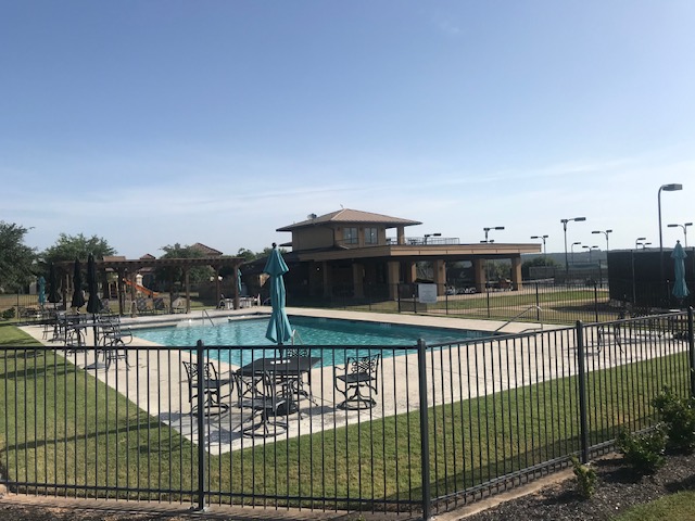1908 Kahala Sunset Drive, Unit A Spicewood, TX 78669 - Photo 12 of 14 a view of a balcony with a yard
