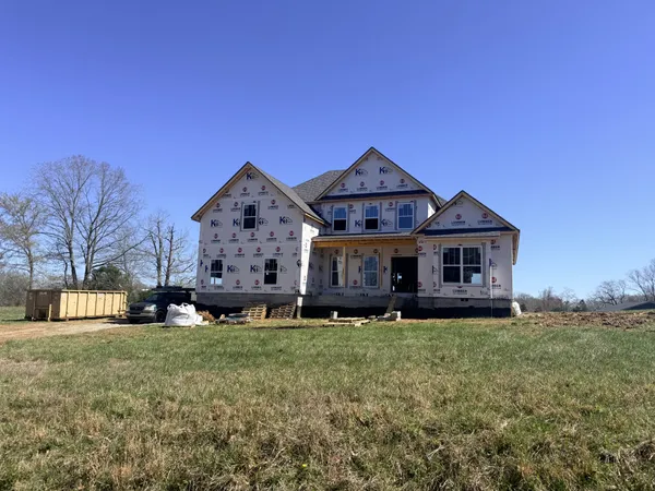 a view of a house with a big yard