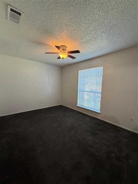 5824 Emrose Terrace Dallas, TX 75227 - Photo 7 of 11 a view of an empty room with a window