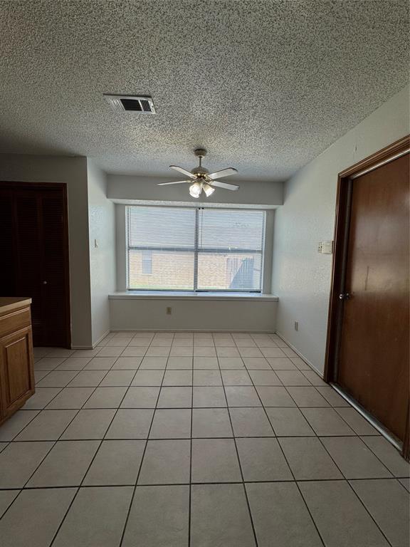 5824 Emrose Terrace Dallas, TX 75227 - Photo 9 of 11 a view of an empty room and window