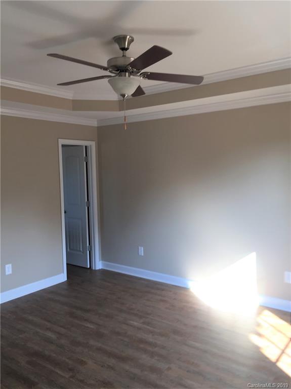371 Rhea Road, Unit 4 York, SC 29745 - Photo 8 of 15 wooden floor in an empty room