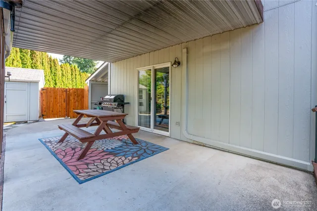 a living room with a rug