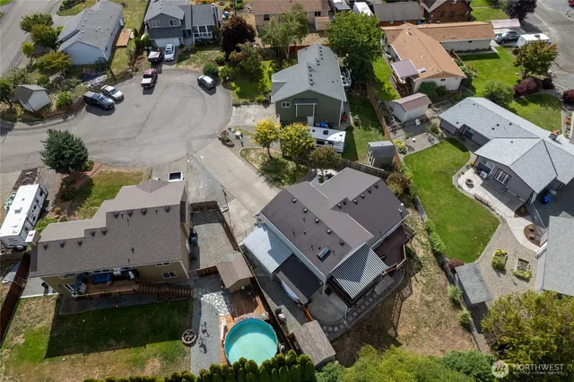 an aerial view of a house with a garden