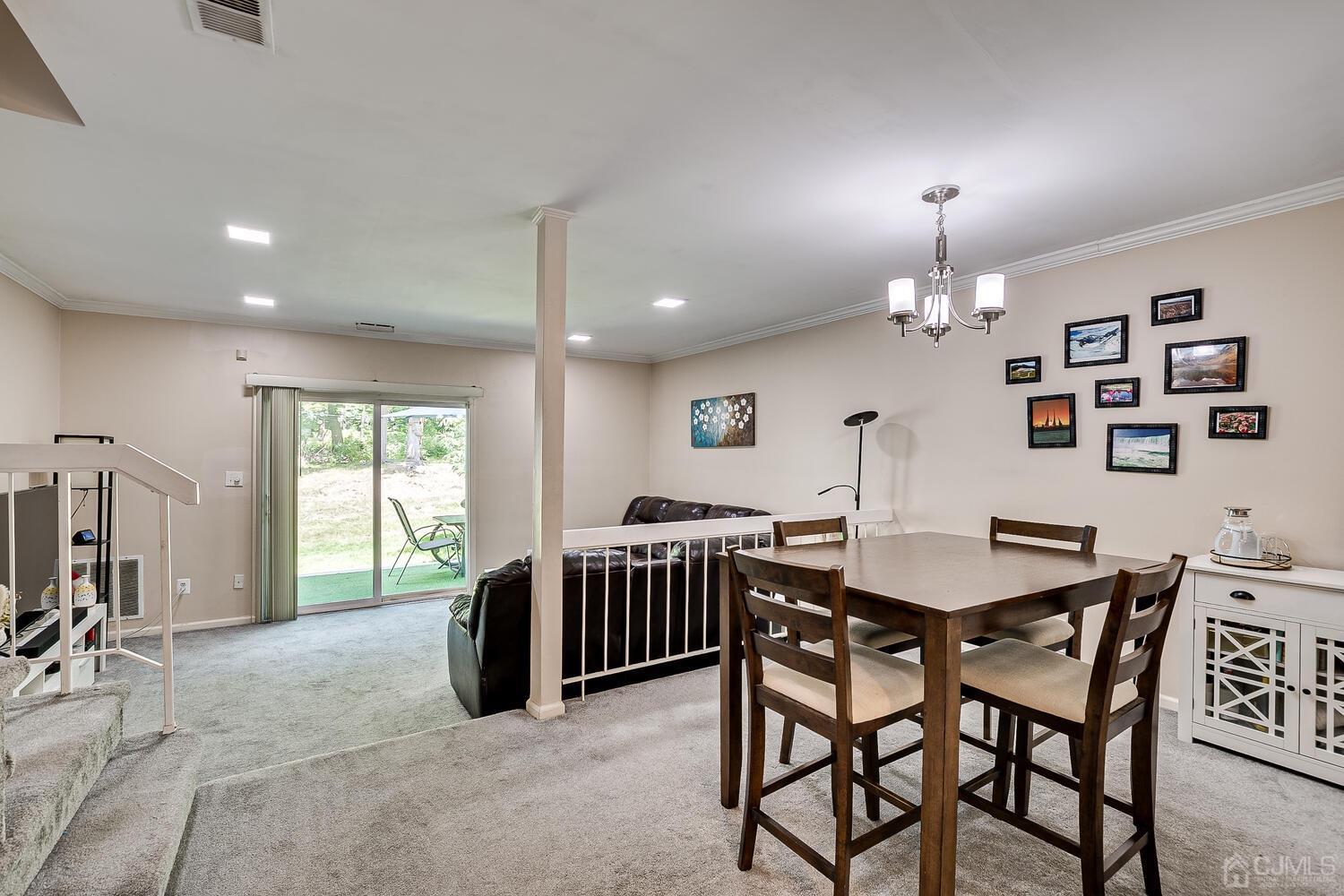 1005 Maplecrest Road Edison, NJ 08820 - Photo 23 of 48 a view of a dining room with furniture and a window