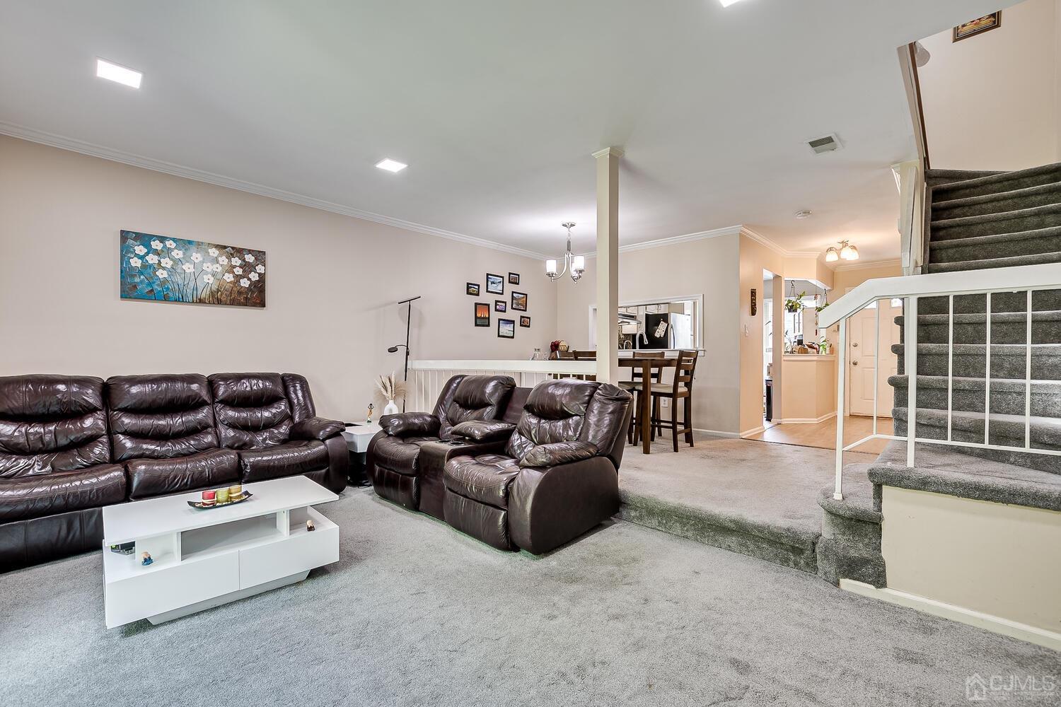 1005 Maplecrest Road Edison, NJ 08820 - Photo 27 of 48 a living room with furniture and a large window