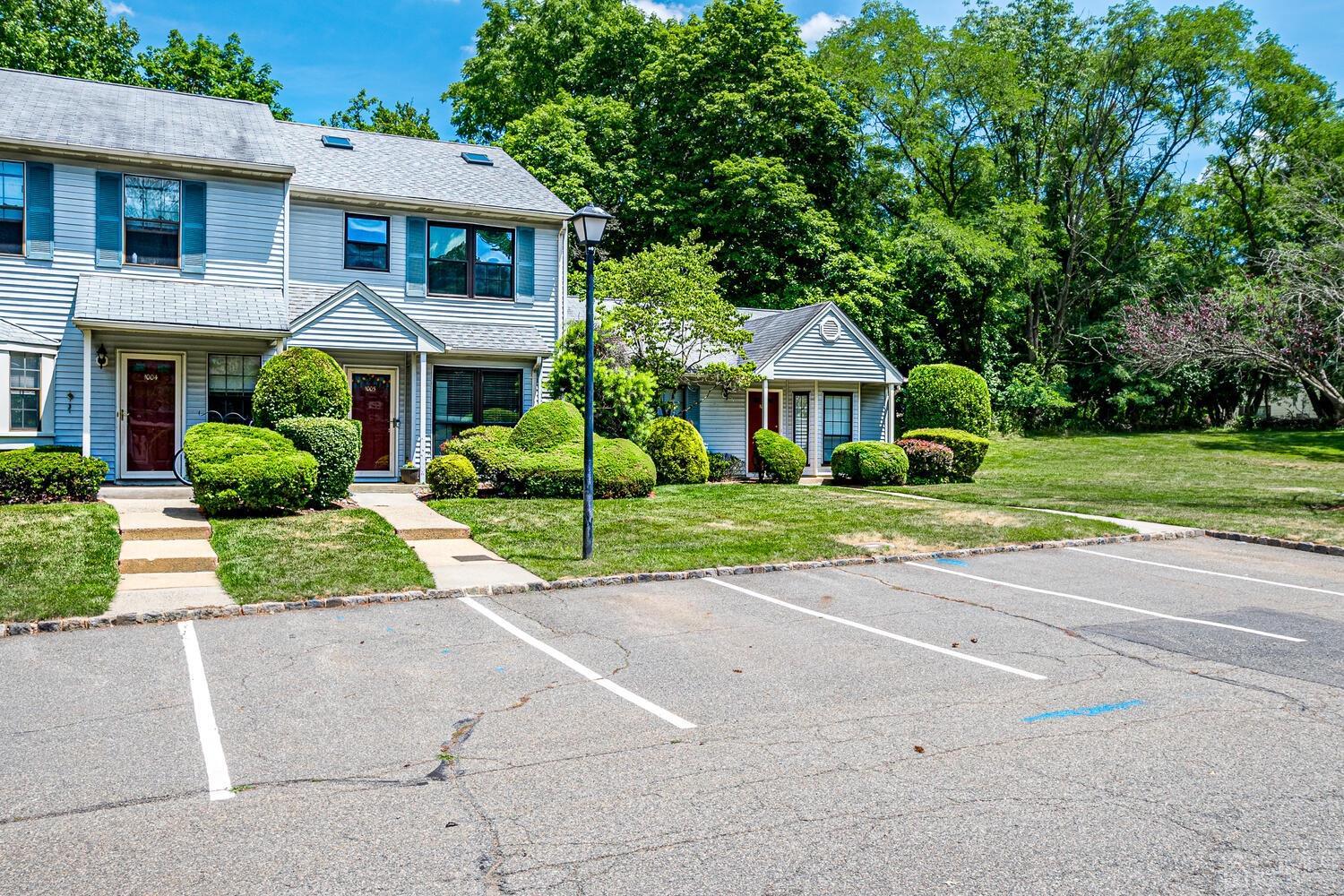 1005 Maplecrest Road Edison, NJ 08820 - Photo 3 of 48 a front view of a house with a yard