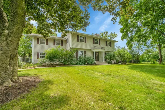 front view of a house with a big yard