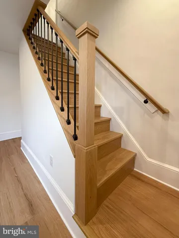 a view of entryway with wooden floor