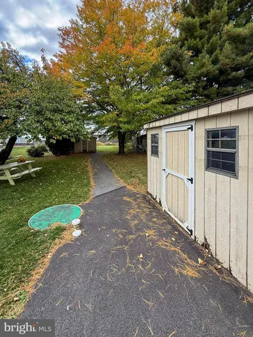 a view of a field with an trees