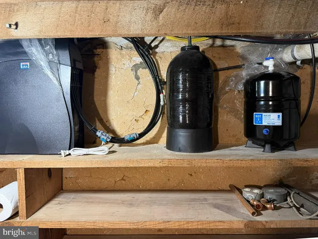 a view of a room with wooden walls