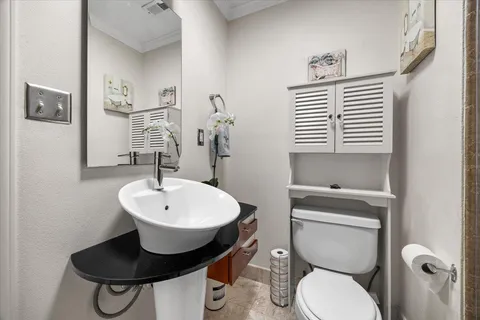 a room with a bed and a cabinets