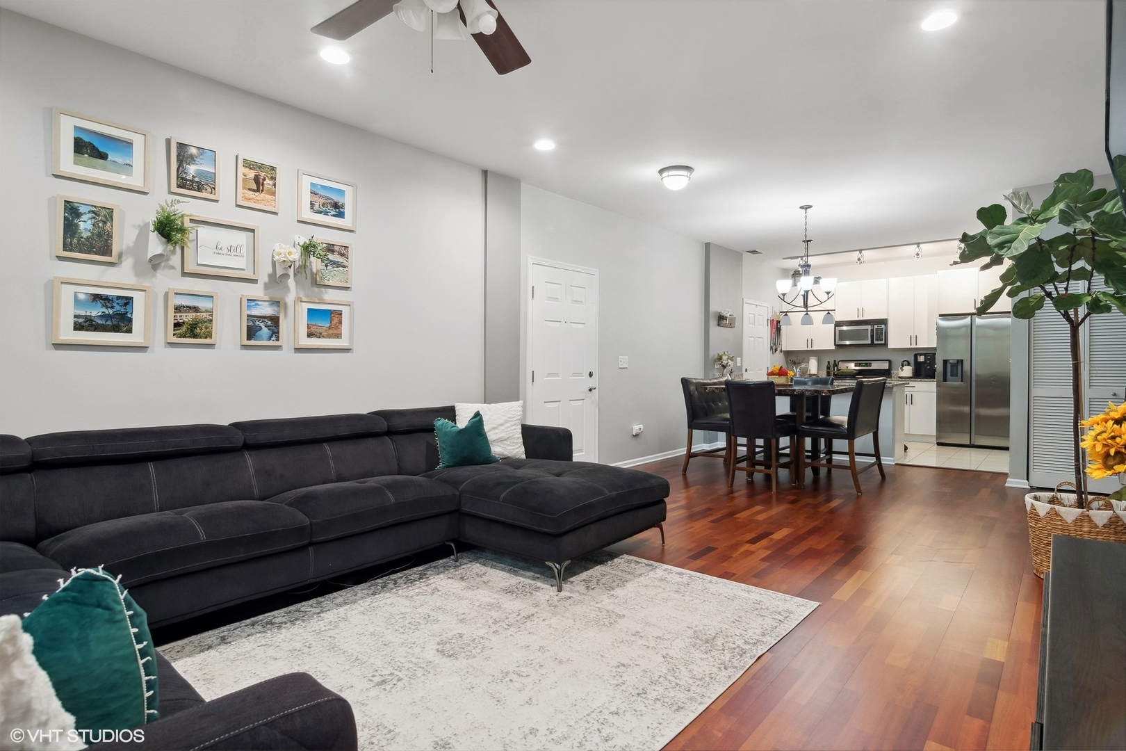 1451 South Halsted Street, Unit 2A Chicago, IL 60607 - Photo 3 of 10 a living room with furniture and wooden floor