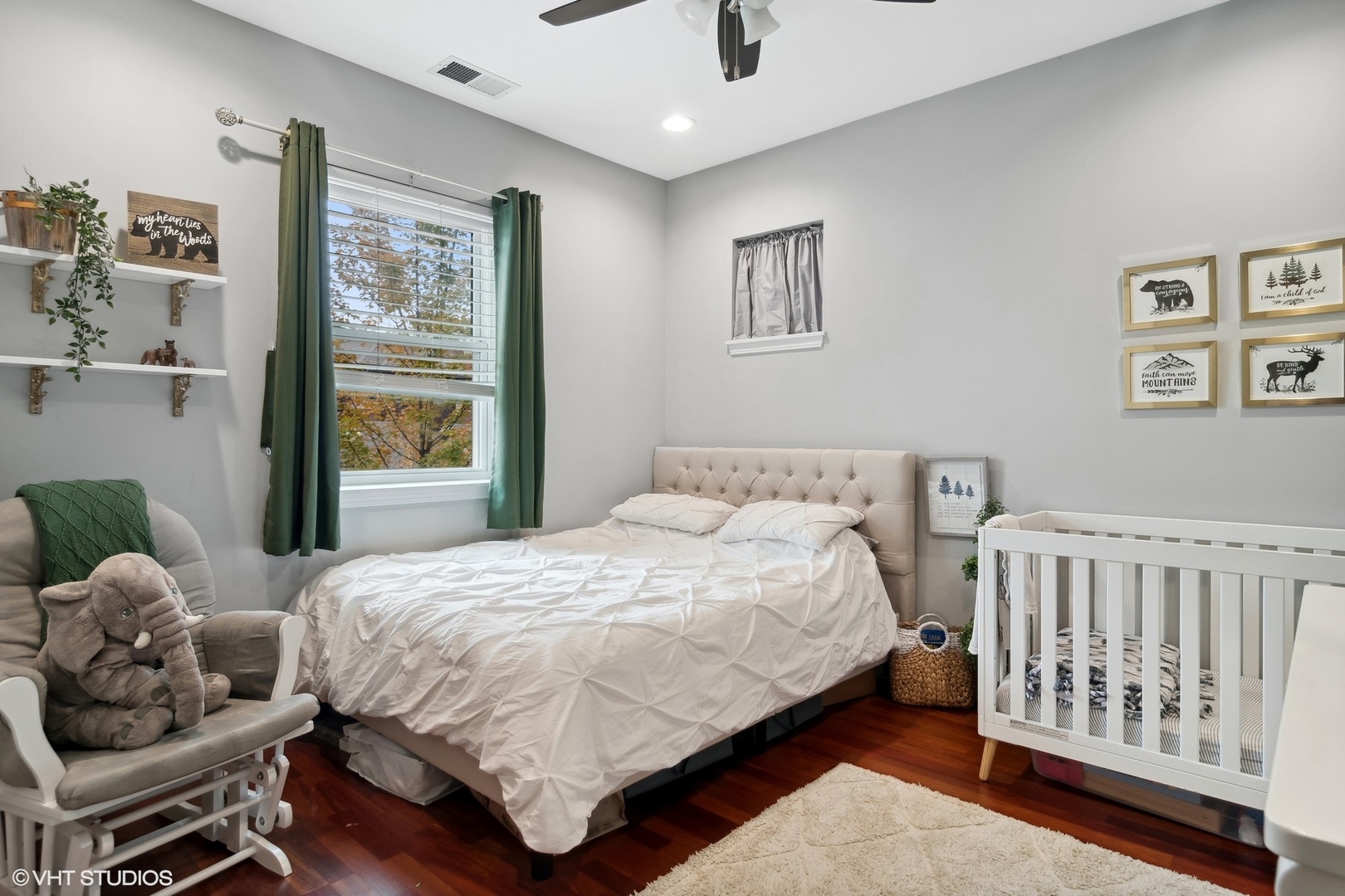 1451 South Halsted Street, Unit 2A Chicago, IL 60607 - Photo 8 of 10 a bedroom with a bed and a window