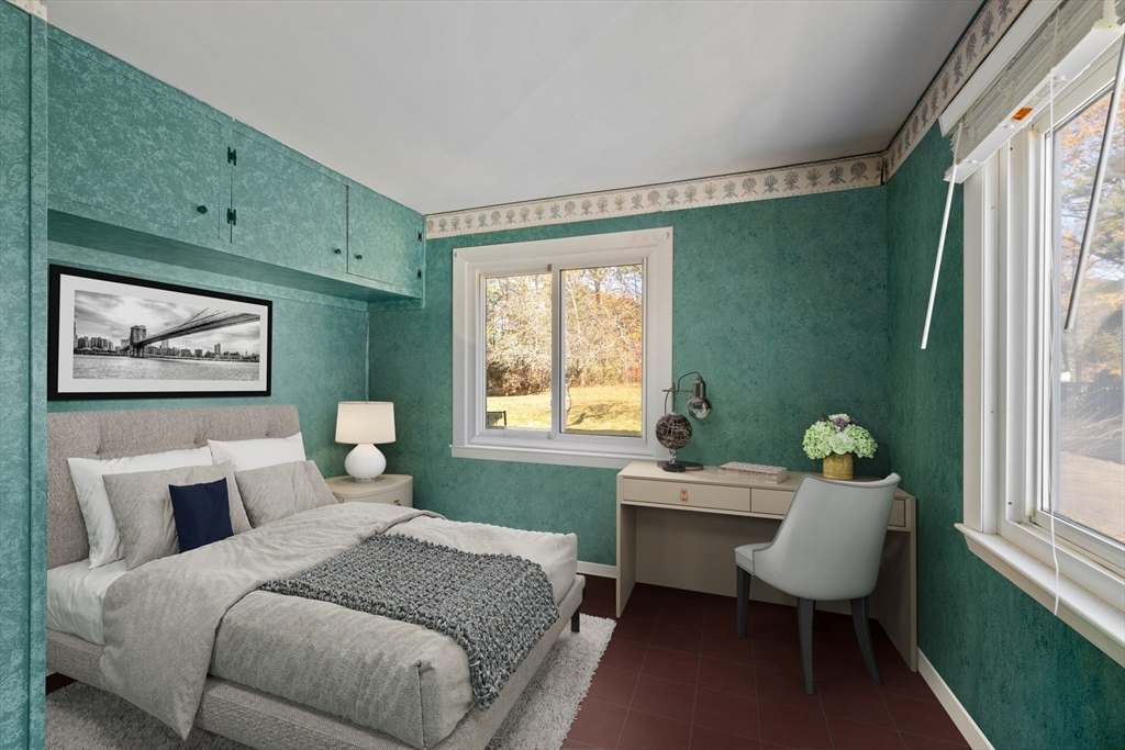 51 Appleton Street Saugus, MA 01906 - Photo 11 of 17 a bedroom with a bed chair and window