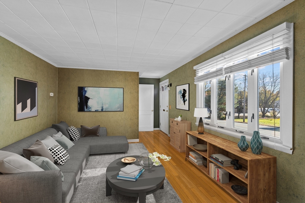 51 Appleton Street Saugus, MA 01906 - Photo 3 of 17 a living room with furniture and a large window