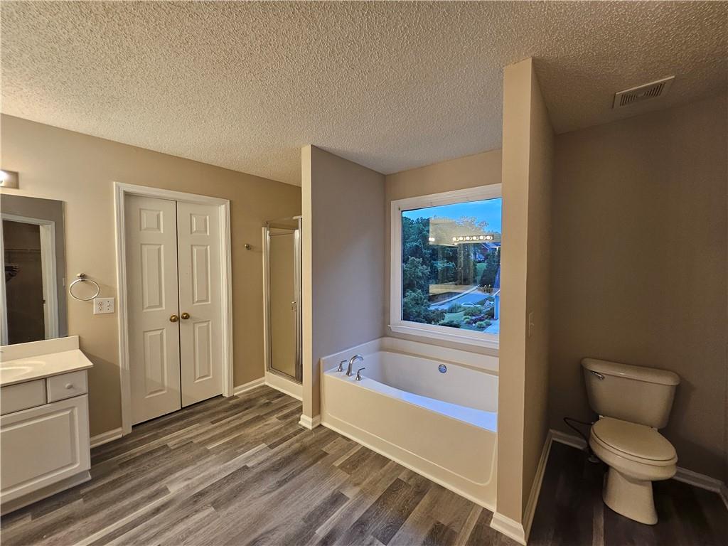 144 Hunters Trace Dallas, GA 30157 - Photo 21 of 34 a bathroom with a sink and a toilet