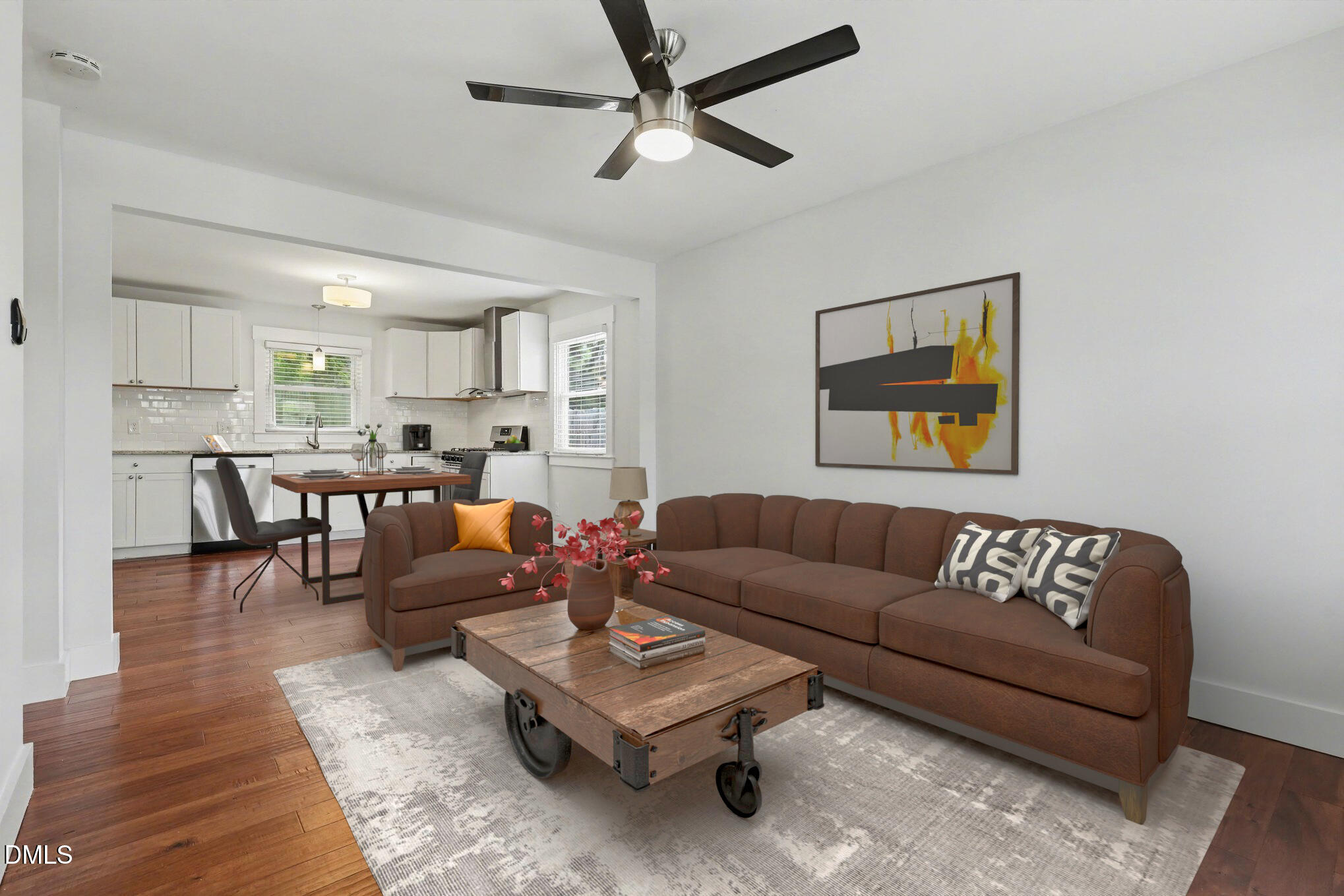 727 South State Street Raleigh, NC 27601 - Photo 4 of 30 a living room with furniture and kitchen view