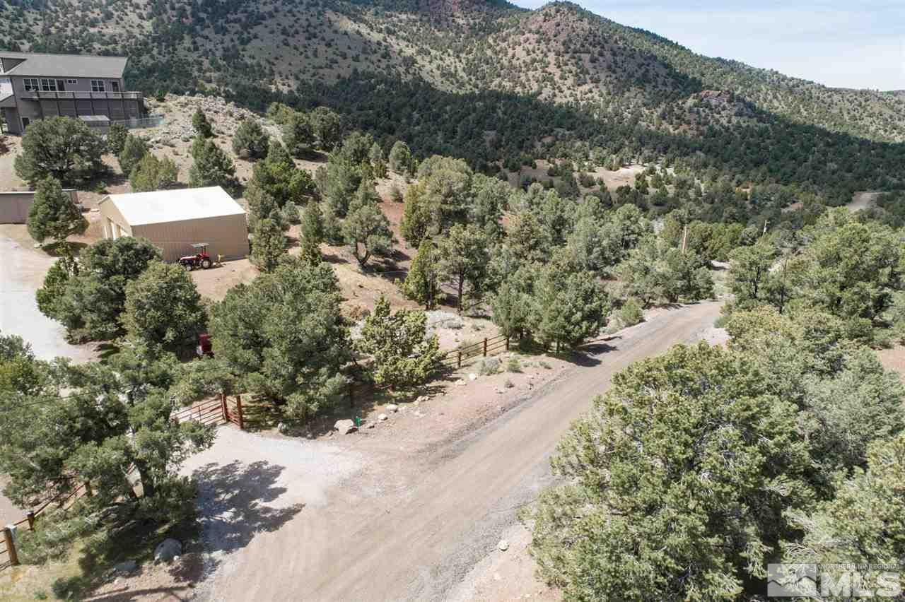 2170 Castle Peak Road, Unit 217 Reno, NV 89521 - Photo 8 of 11 a view of a yard with a tree