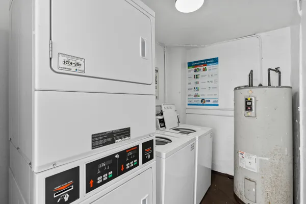 an aerial view of a house with a swimming pool yard and mountain view in back