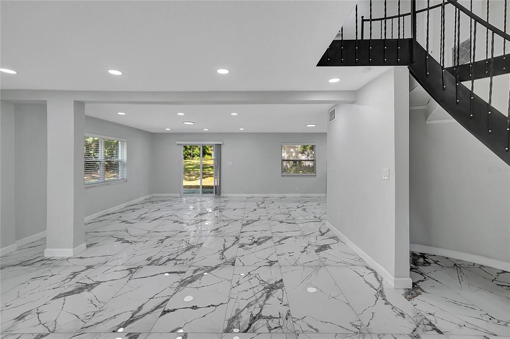 604 Druid Hills Road Temple Terrace, FL 33617 - Photo 11 of 59 a view of an empty room and window