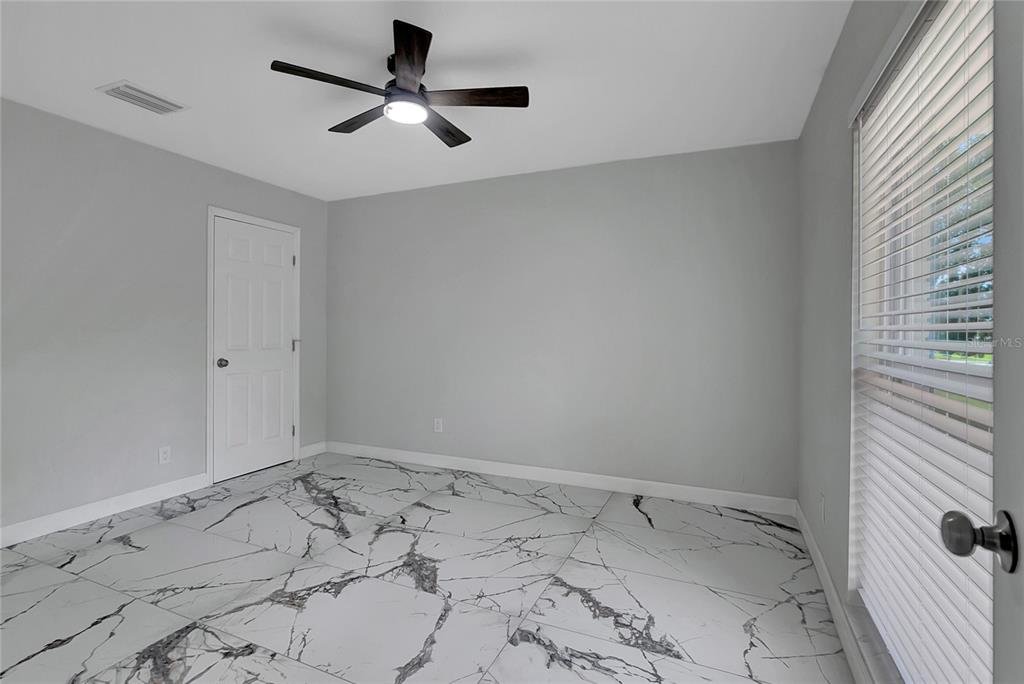 604 Druid Hills Road Temple Terrace, FL 33617 - Photo 23 of 59 a view of a room with a sink and cabinets