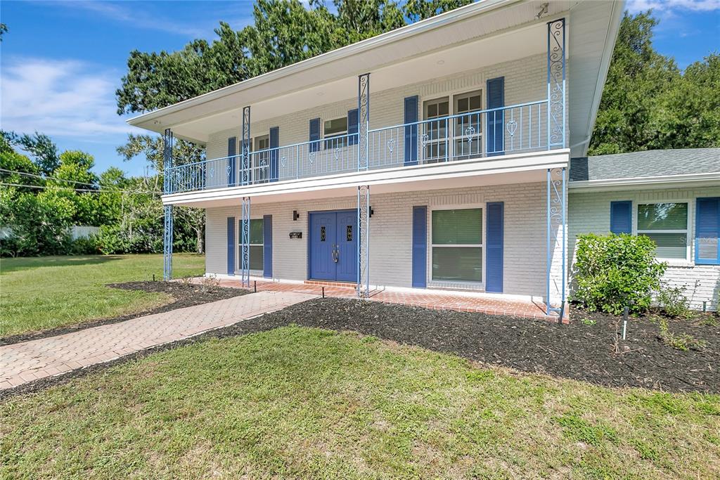 604 Druid Hills Road Temple Terrace, FL 33617 - Photo 4 of 59 front view of a house with a yard