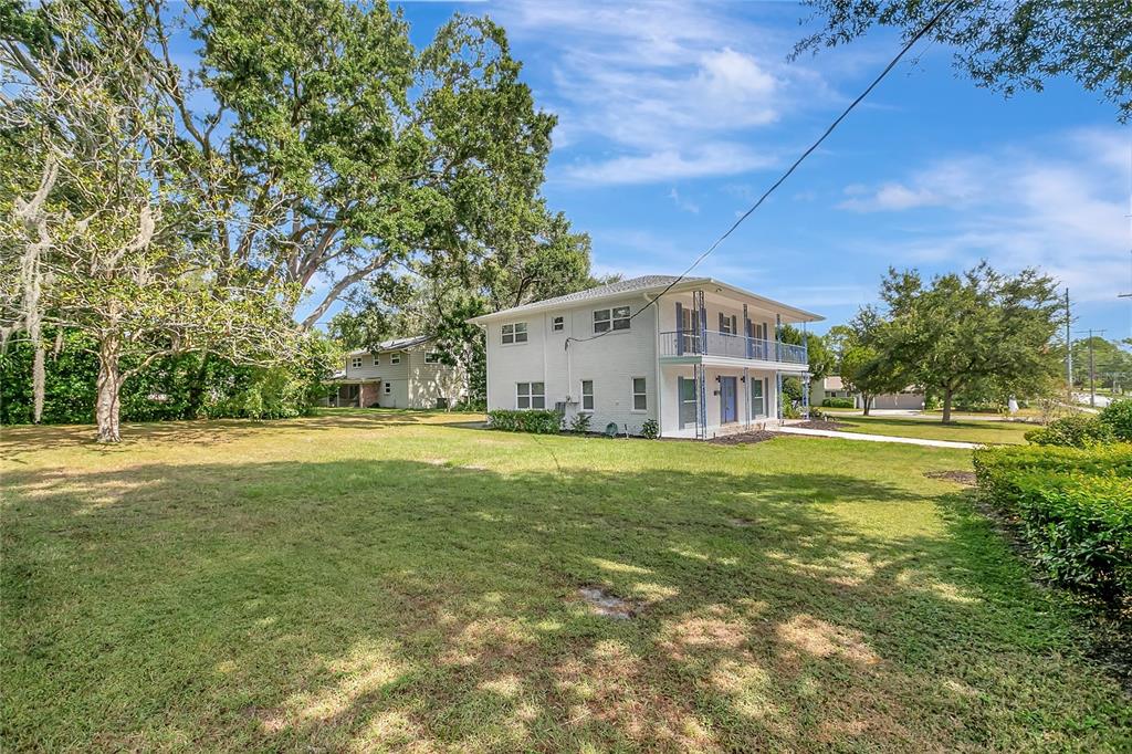 604 Druid Hills Road Temple Terrace, FL 33617 - Photo 55 of 59 a view of a house with a big yard