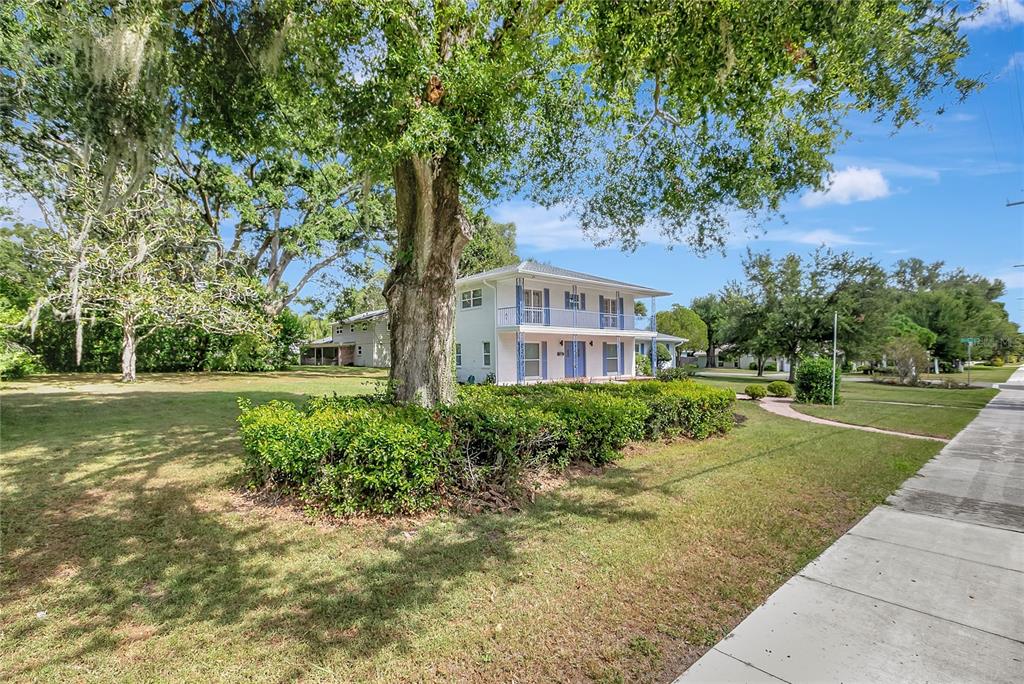 604 Druid Hills Road Temple Terrace, FL 33617 - Photo 58 of 59 a front view of a house with a yard