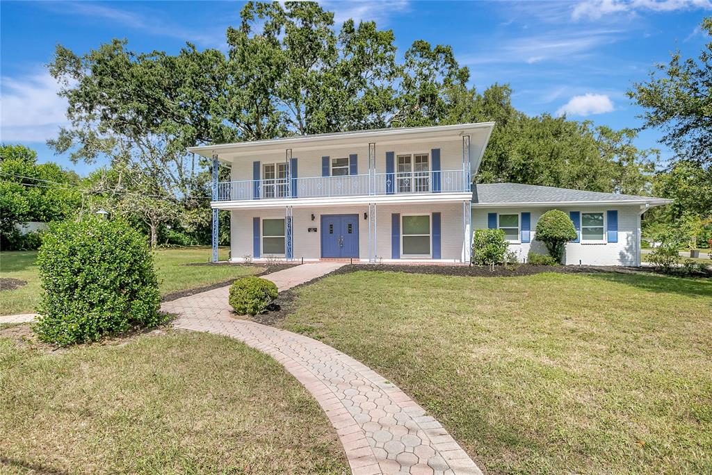 604 Druid Hills Road Temple Terrace, FL 33617 - Photo 59 of 59 a front view of a house with garden