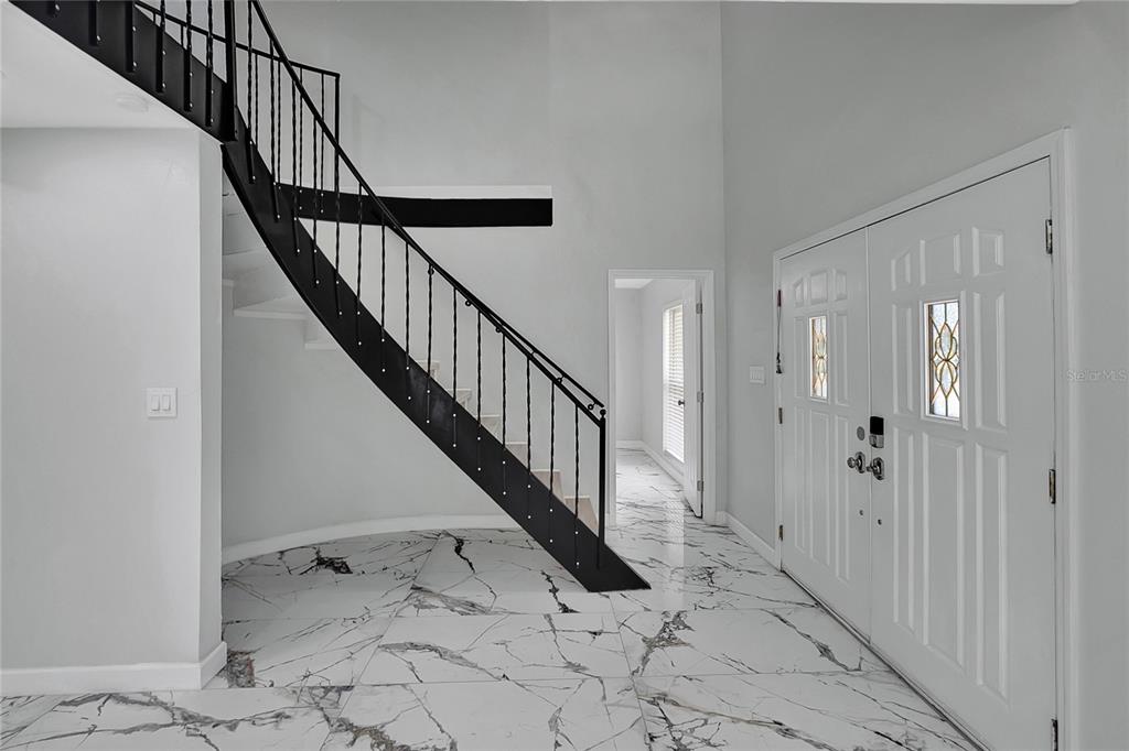 604 Druid Hills Road Temple Terrace, FL 33617 - Photo 7 of 59 a view of a hallway with staircase