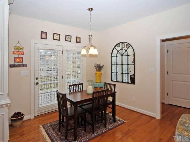 306 Brandywine Drive Raleigh, NC 27607 - Photo 9 of 18 Eat-in kitchen overlooks backyard and deck.