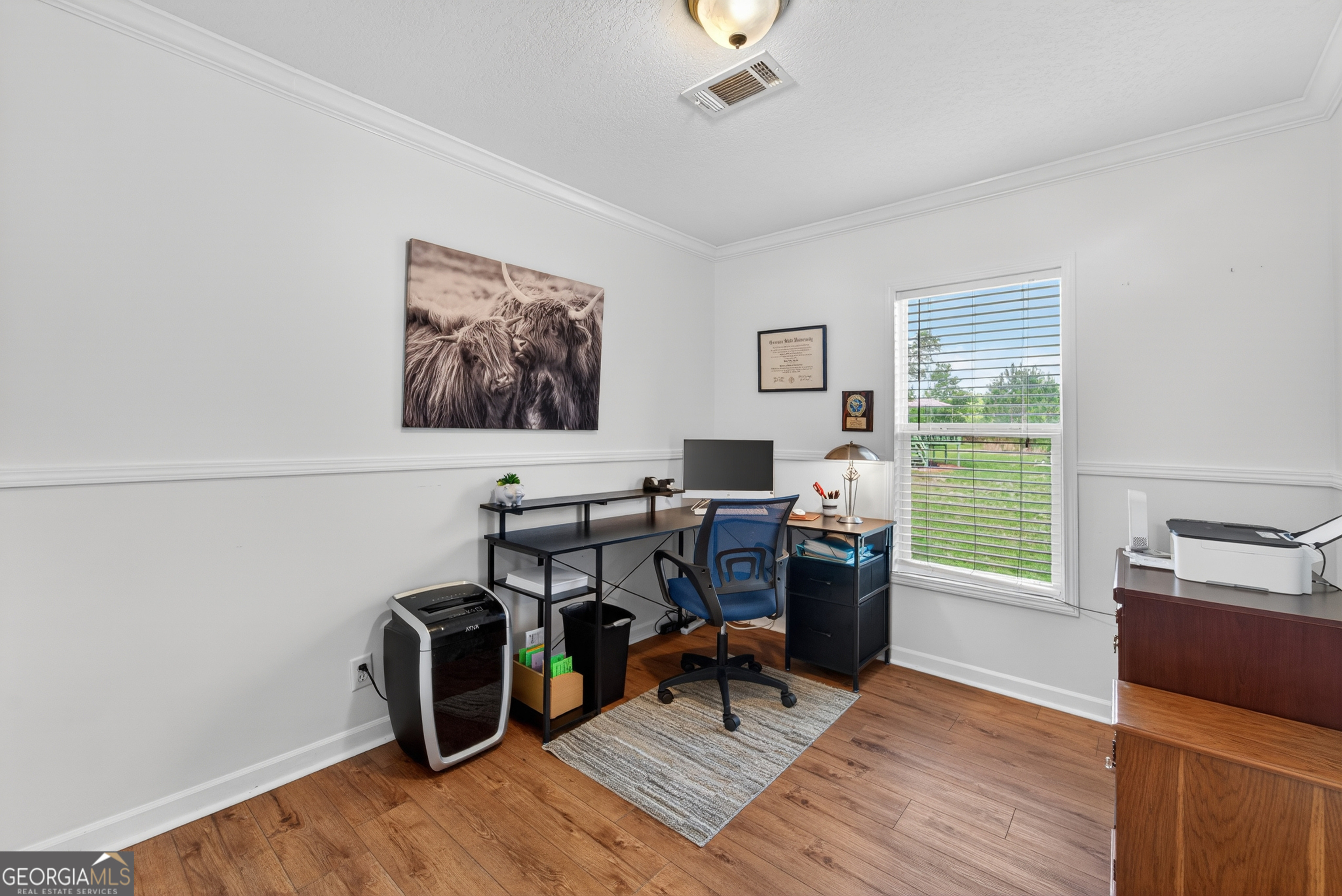 1953 Raybon Road West Hoboken, GA 31542 - Photo 20 of 31 a view of a workspace with furniture and a window