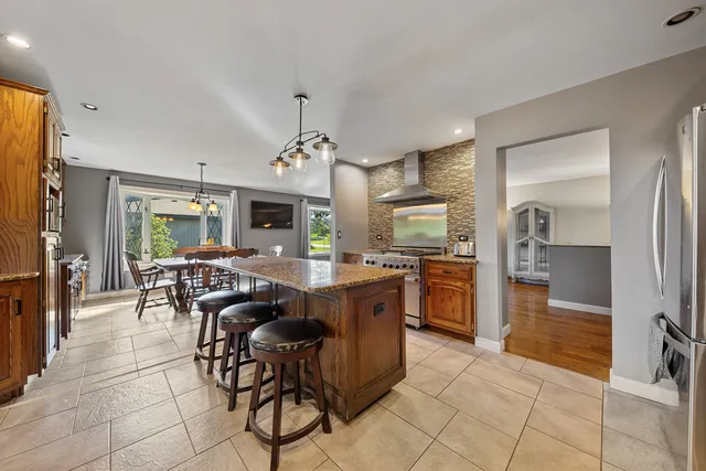 a view of a dining room kitchen and a window