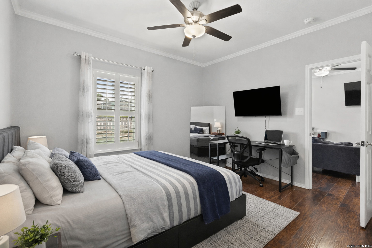 441 Cimarron Spring Branch, TX 78070 - Photo 11 of 20 a bedroom with a bed and a flat screen tv