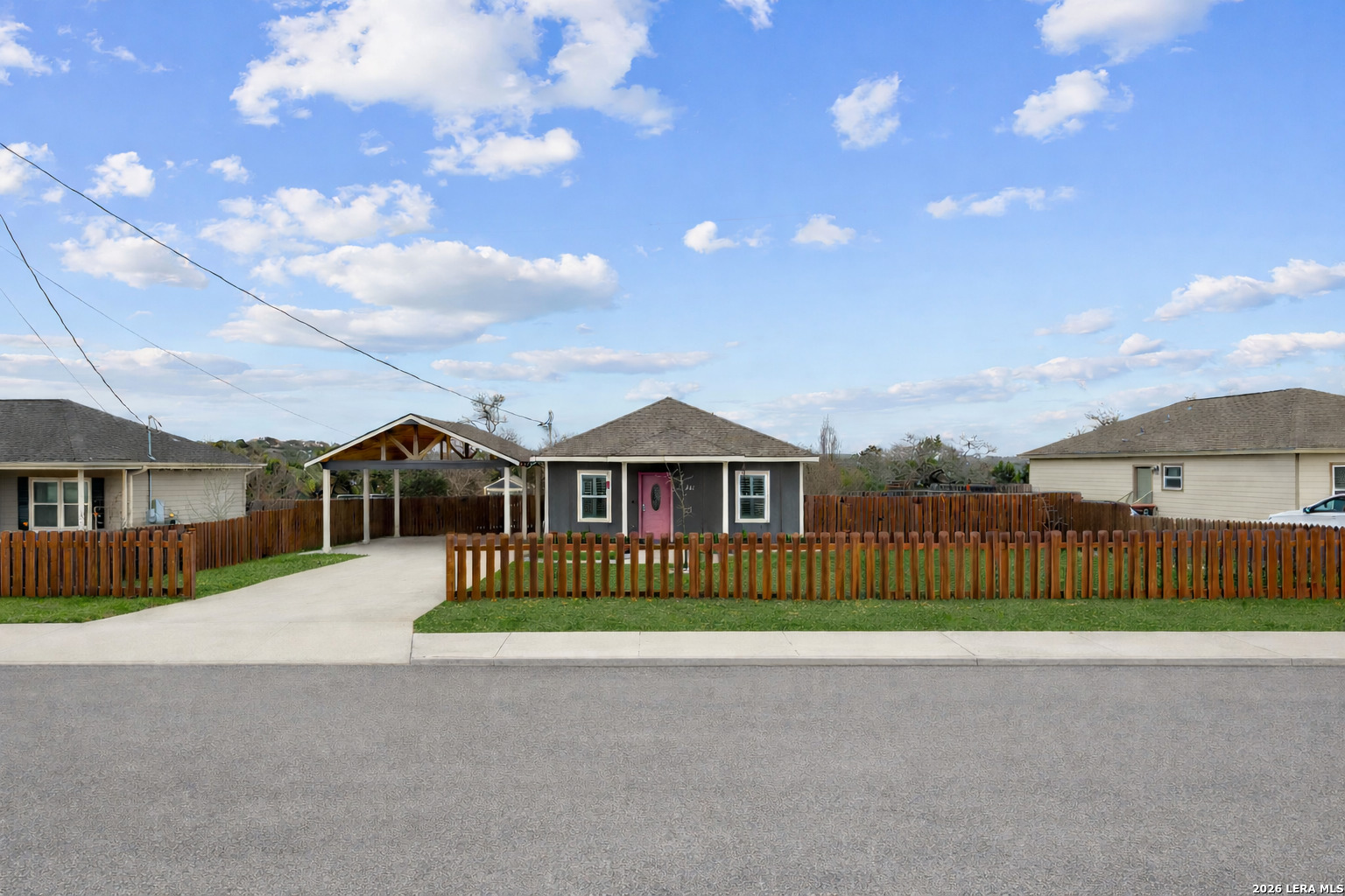 441 Cimarron Spring Branch, TX 78070 - Photo 2 of 20 a front view of a house with a garden
