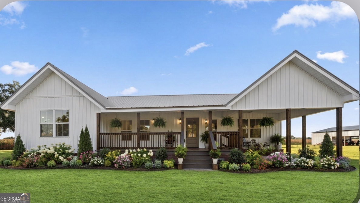 front view of a house with a yard
