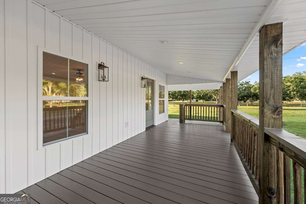 1335 Clifford Loop Blackshear, GA 31516 - Photo 15 of 43 a view of a porch and wooden floor