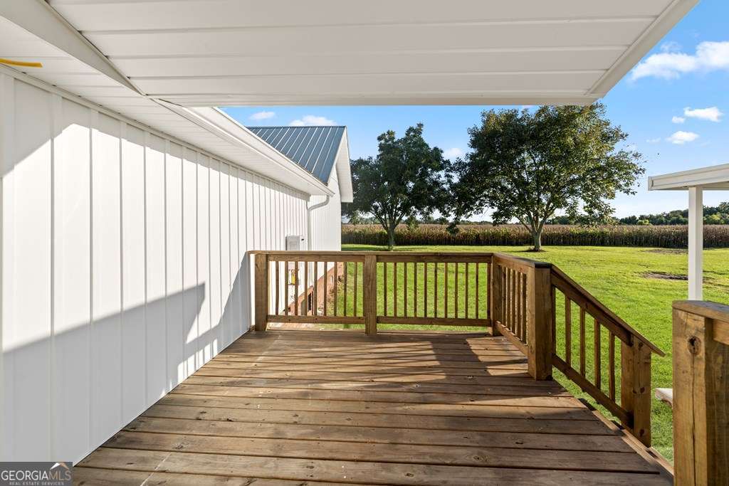 1335 Clifford Loop Blackshear, GA 31516 - Photo 18 of 43 a view of deck with wooden floor and outdoor space