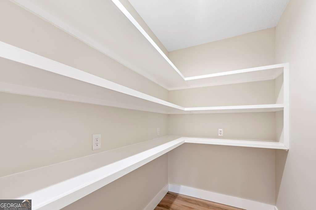 1335 Clifford Loop Blackshear, GA 31516 - Photo 27 of 43 a view of an empty walk in closet