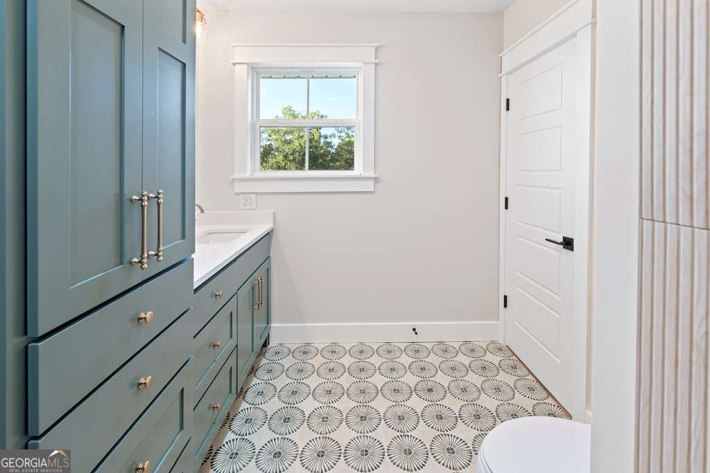 1335 Clifford Loop Blackshear, GA 31516 - Photo 39 of 43 a bathroom with a sink and a bathtub