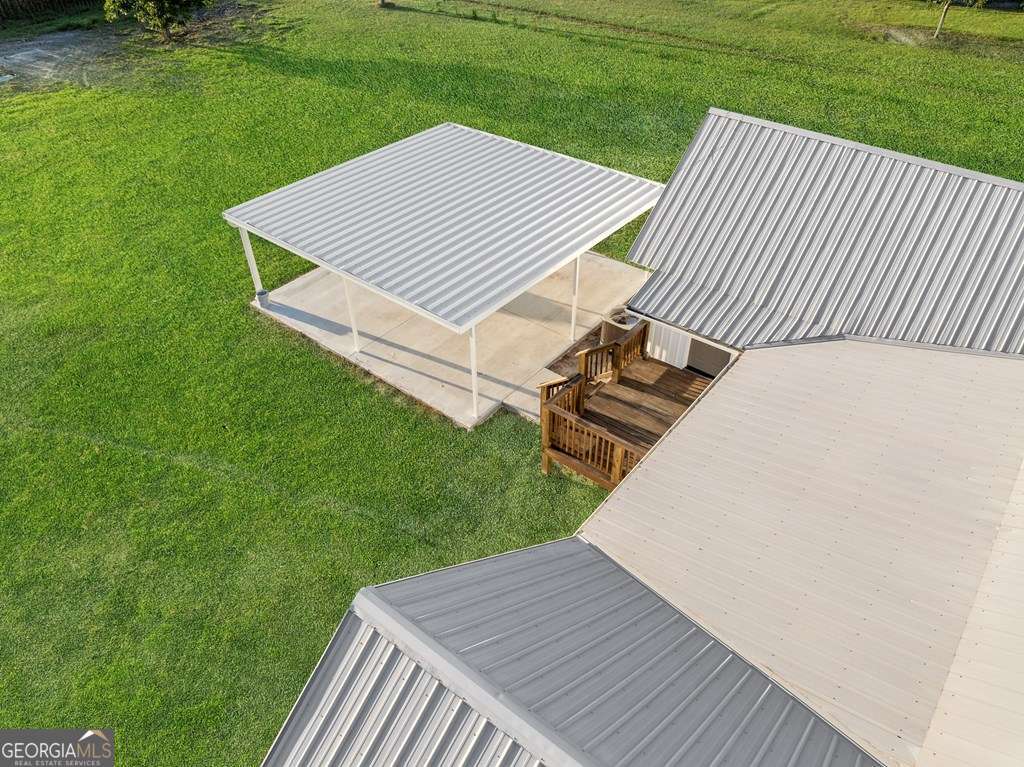 1335 Clifford Loop Blackshear, GA 31516 - Photo 7 of 43 a view of a backyard with wooden floor