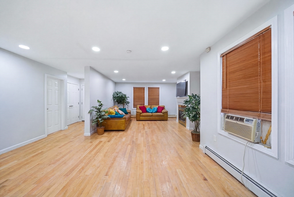 39 Hawthorne Street, Unit 39 Boston, MA 02119 - Photo 6 of 33 a view of a living room and dining room
